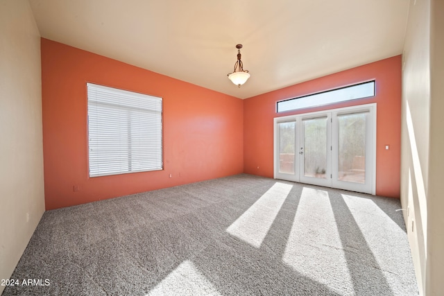 empty room with carpet flooring