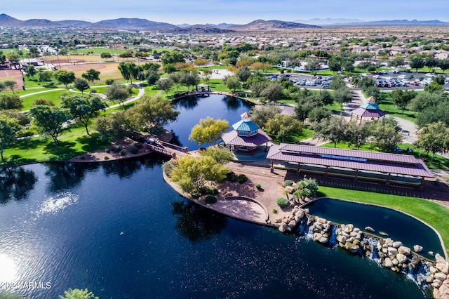 aerial view featuring a water and mountain view