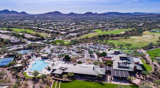 birds eye view of property featuring a mountain view