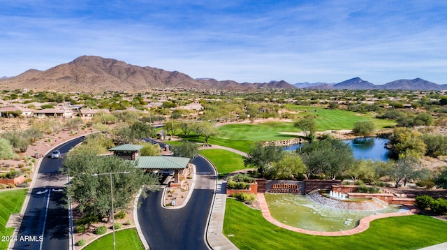 birds eye view of property featuring a water and mountain view