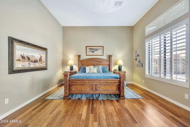 bedroom featuring hardwood / wood-style flooring