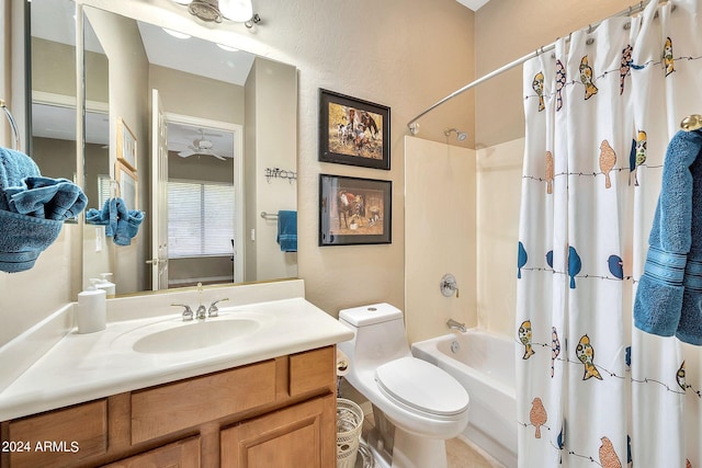 full bathroom with shower / tub combo, vanity, toilet, and ceiling fan