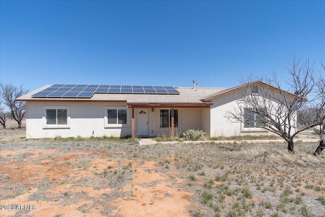 10193 E Windtalker Rd, Hereford, AZ 85615 - ranch-style house with roof mounted solar panels and stucco siding