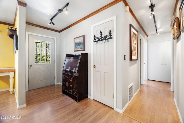 511 Canyon Springs Rd, Prescott, AZ 86303 - entrance foyer with light wood-type flooring, crown molding, and track lighting
