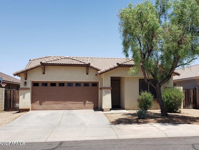 view of front of property with a garage