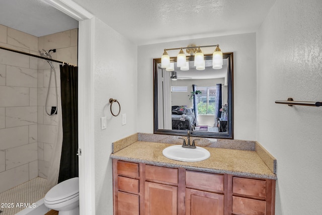 3500 N Hayden Rd Unit 203, Scottsdale, AZ 85251 - full bathroom featuring a shower stall, toilet, and vanity