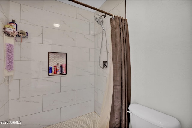 3500 N Hayden Rd Unit 203, Scottsdale, AZ 85251 - bathroom featuring a tile shower and toilet