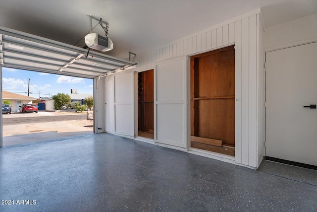 garage featuring a garage door opener