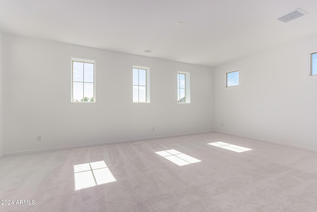 8628 W Solano Dr, Glendale, AZ 85305 - unfurnished room featuring light colored carpet and baseboards