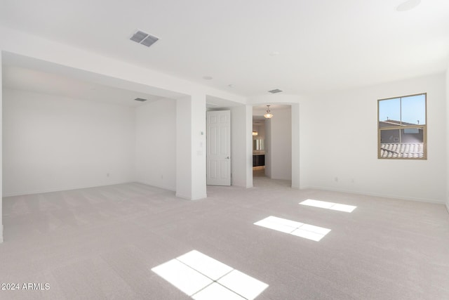 8628 W Solano Dr, Glendale, AZ 85305 - unfurnished room with light carpet and baseboards