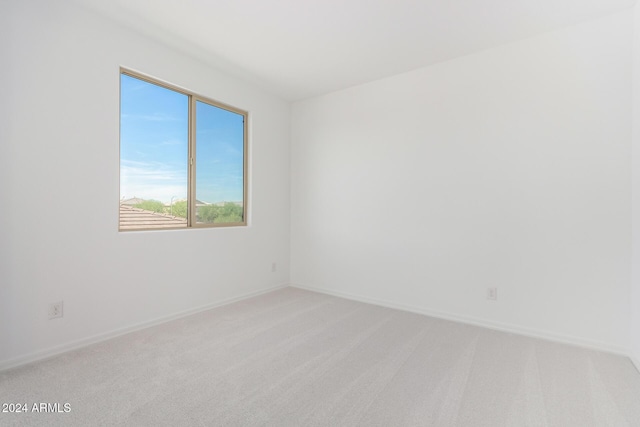 8628 W Solano Dr, Glendale, AZ 85305 - unfurnished room with light carpet and baseboards