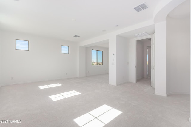 8628 W Solano Dr, Glendale, AZ 85305 - empty room featuring light carpet and baseboards
