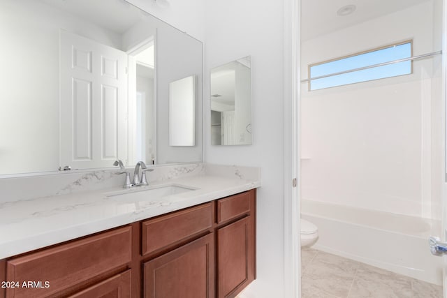 full bathroom with toilet, bathtub / shower combination, vanity, and tile patterned flooring