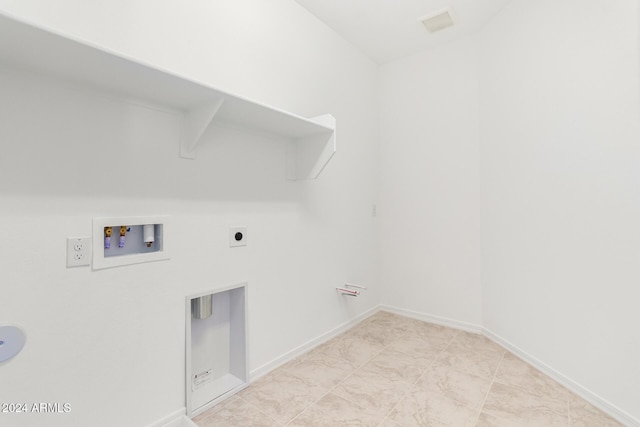 8628 W Solano Dr, Glendale, AZ 85305 - laundry room featuring washer hookup, electric dryer hookup, and baseboards