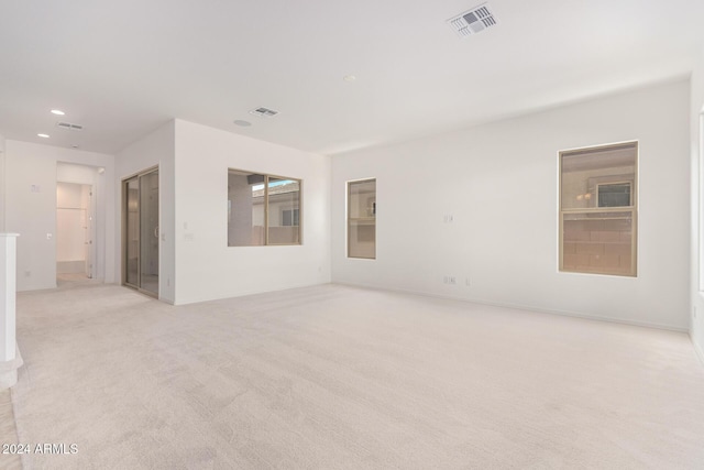 8628 W Solano Dr, Glendale, AZ 85305 - spare room featuring light colored carpet and recessed lighting