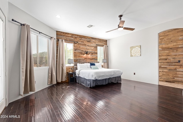 2731 W Desert Ranch Rd, Phoenix, AZ 85086 - bedroom with an accent wall, wood finished floors, wooden walls, ceiling fan, and recessed lighting