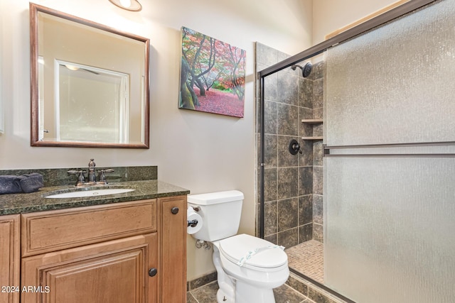 2731 W Desert Ranch Rd, Phoenix, AZ 85086 - bathroom with toilet, a tile shower, and vanity