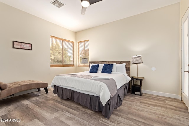2731 W Desert Ranch Rd, Phoenix, AZ 85086 - bedroom with light wood-style flooring, baseboards, and a ceiling fan