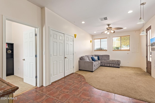 2731 W Desert Ranch Rd, Phoenix, AZ 85086 - living room featuring ceiling fan, dark colored carpet, and recessed lighting