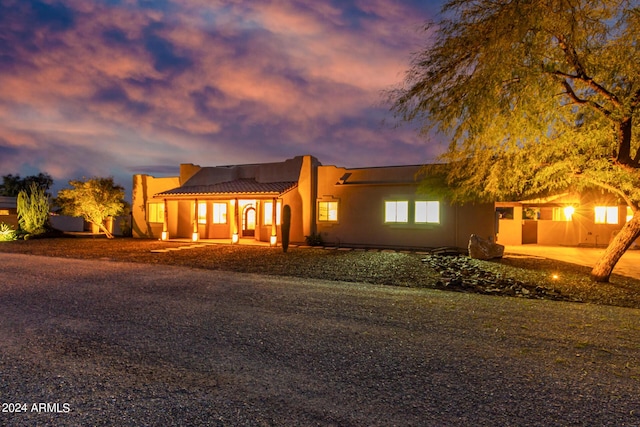 2731 W Desert Ranch Rd, Phoenix, AZ 85086 - view of front of property with stucco siding and a tiled roof