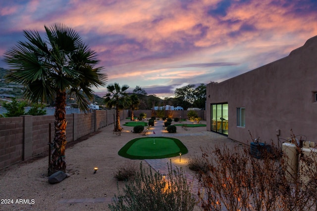 2731 W Desert Ranch Rd, Phoenix, AZ 85086 - fenced backyard featuring a putting green and a patio