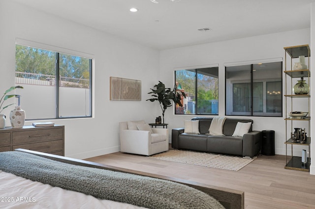 bedroom featuring light wood-type flooring