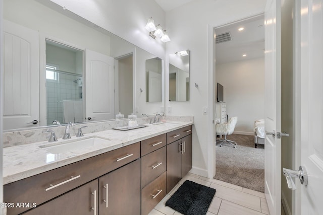 10886 N 137th St, Scottsdale, AZ 85259 - ensuite bathroom featuring double vanity, tiled shower, visible vents, and a sink