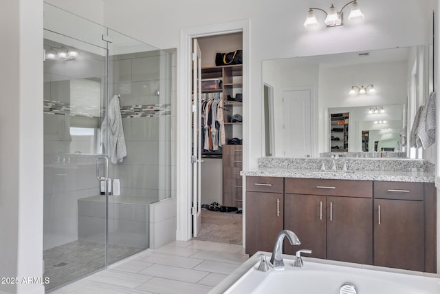 10886 N 137th St, Scottsdale, AZ 85259 - full bathroom featuring vanity, a spacious closet, a stall shower, and a washtub
