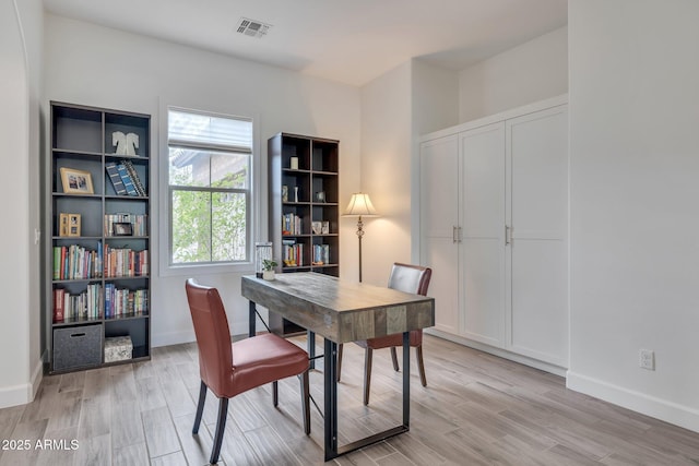 10886 N 137th St, Scottsdale, AZ 85259 - home office with baseboards, visible vents, and light wood-type flooring