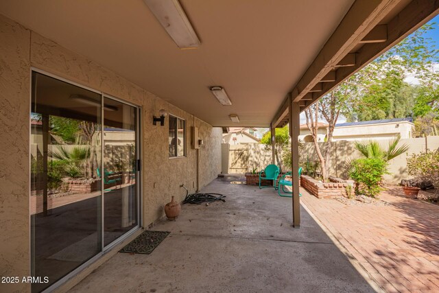 view of patio with fence