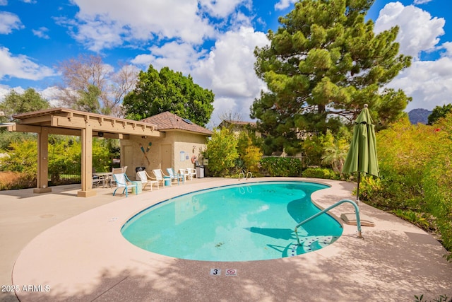 view of swimming pool featuring a fenced in pool and a patio area