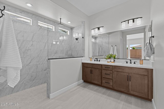 20209 W San Miguel Ave, Litchfield Park, AZ 85340 - bathroom with a walk in shower, double vanity, and recessed lighting