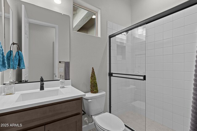 20209 W San Miguel Ave, Litchfield Park, AZ 85340 - bathroom with a stall shower, toilet, and vanity