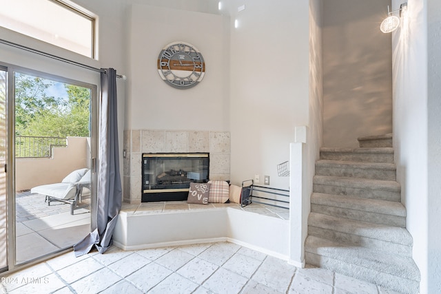 stairway with a fireplace