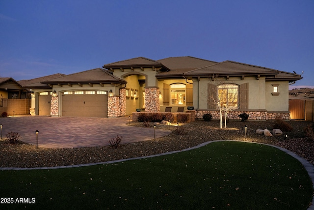 prairie-style house featuring a garage