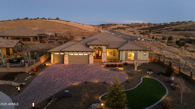 view of front of property with a garage