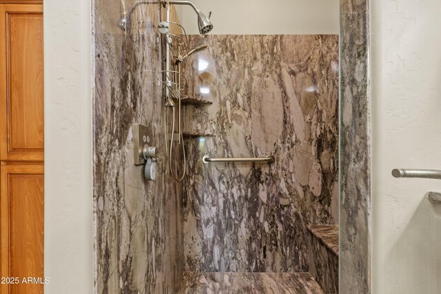 interior space with tiled shower