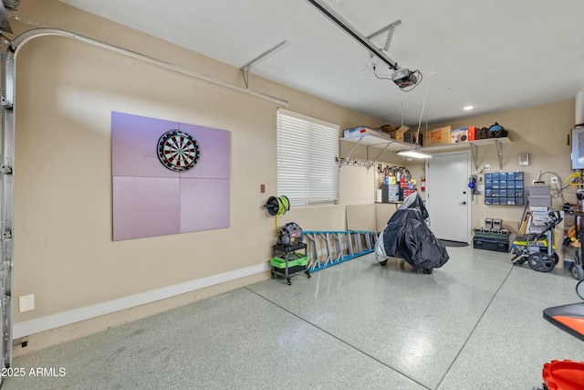 garage featuring a garage door opener