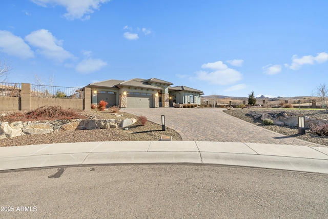 view of front of home with a garage