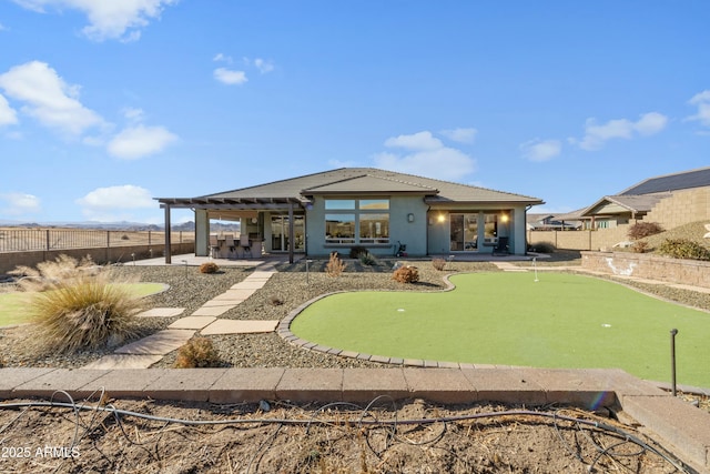 rear view of property with a patio