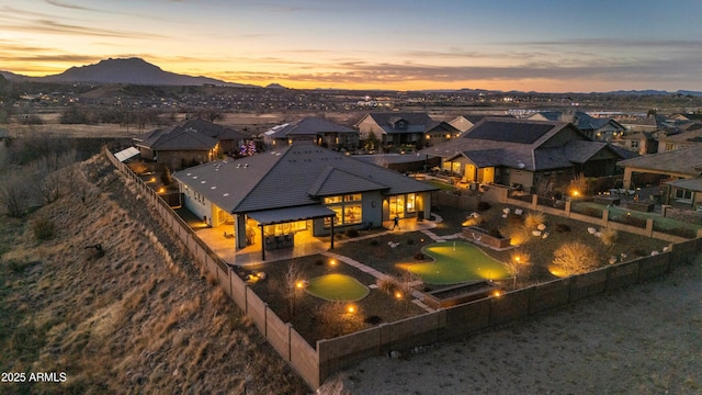 exterior space featuring a patio and a mountain view