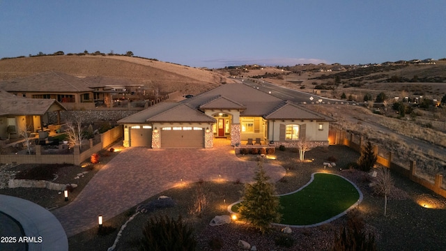 view of front of property featuring a garage