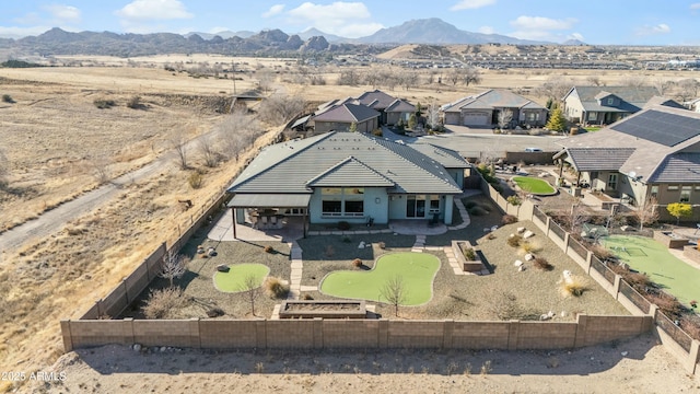 drone / aerial view featuring a mountain view