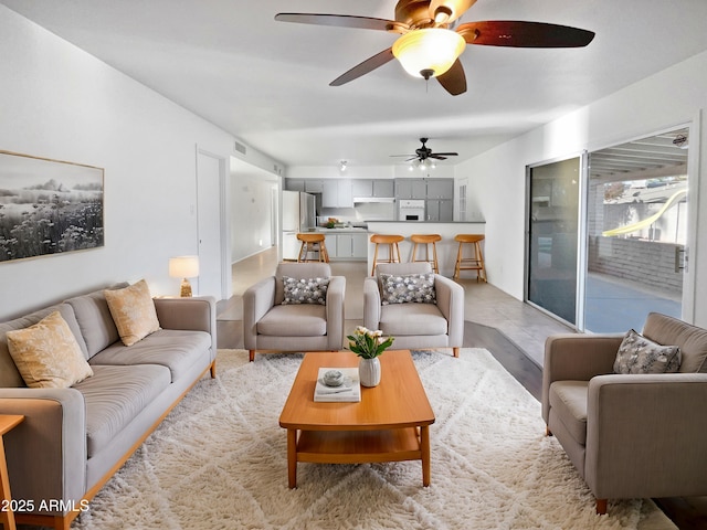 living room featuring ceiling fan