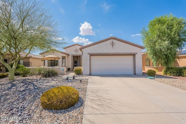 view of front of property with a garage