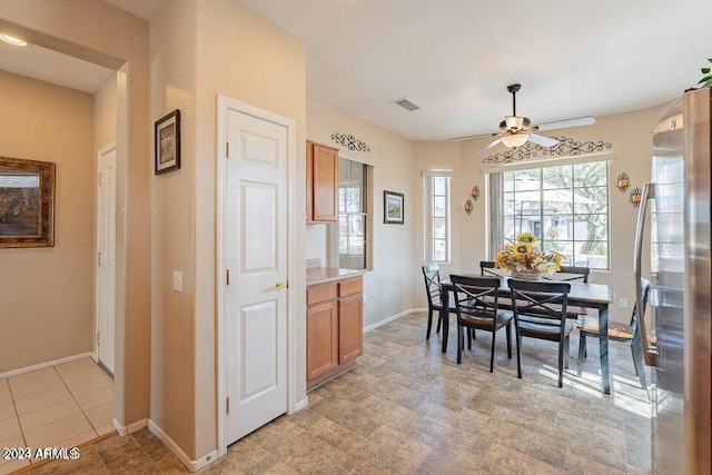 dining room with ceiling fan