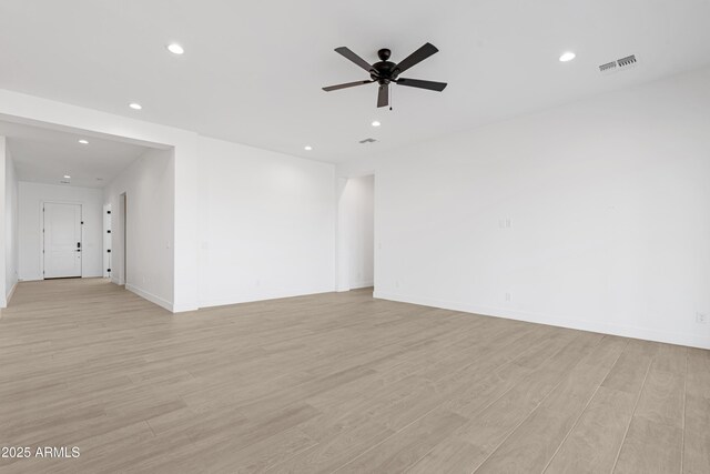2083 W Lincoln Ct, San Tan Valley, AZ 85144 - spare room featuring recessed lighting, light wood-style floors, ceiling fan, and baseboards