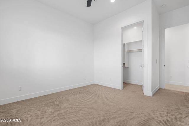 2083 W Lincoln Ct, San Tan Valley, AZ 85144 - unfurnished bedroom featuring light carpet, baseboards, recessed lighting, a walk in closet, and a closet