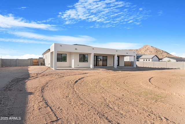 2083 W Lincoln Ct, San Tan Valley, AZ 85144 - back of property featuring a fenced backyard, stucco siding, a patio area, and central air condition unit