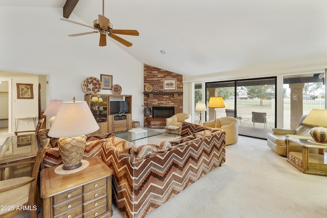 living room with beamed ceiling, plenty of natural light, carpet flooring, and a brick fireplace